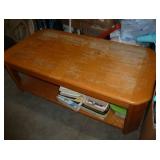 Coffee table measures 24 wide x 47 long x 16 tall