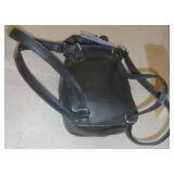 Three new small black purses