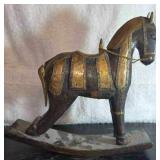 Antique hand-carved rocking horse, likely of Indonesian origin