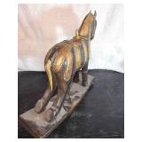 Antique hand-carved rocking horse, likely of Indonesian origin