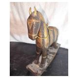 Antique hand-carved rocking horse, likely of Indonesian origin