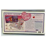 Misc. Pre-owned Board Games Including I Love Lucy, Dog Opoly & Monopoly The .Com Edition