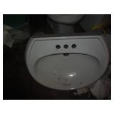 Unused Porcelain walls mount sink a...