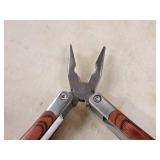 Multi-Use Hand Tool - Blades, Pliers, Saw, Opener, Drivers