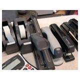 Lot of (1 Tote) Assorted Office Supplies - Staplers, Calculators, Tape Dispensers, Scissors
