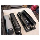 Lot of (1 Tote) Assorted Office Supplies - Staplers, Calculators, Tape Dispensers, Scissors