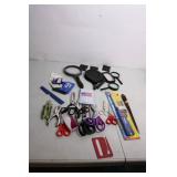 Assortment of Magnifying Glasses, Scissors, and Tools