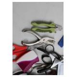 Assortment of Magnifying Glasses, Scissors, and Tools