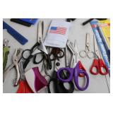 Assortment of Magnifying Glasses, Scissors, and Tools