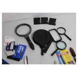 Assortment of Magnifying Glasses, Scissors, and Tools