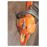 Used Husqvarna 450 Chainsaw with Orange Bar