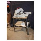 Used Milwaukee Chop Saw on Table Stand