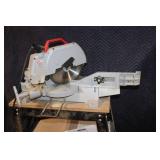 Used Milwaukee Chop Saw on Table Stand