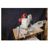Used Milwaukee Chop Saw on Table Stand