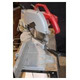 Used Milwaukee Chop Saw on Table Stand