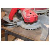 Used Milwaukee Chop Saw on Table Stand
