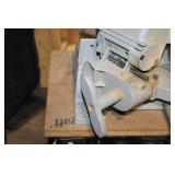 Used Milwaukee Chop Saw on Table Stand