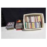 Collection of Cassette Tapes and CDs Featuring Holiday and Jazz Music
