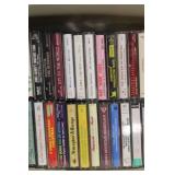 Collection of Cassette Tapes and CDs Featuring Holiday and Jazz Music