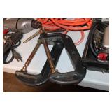 Assortment of Power Tools and Accessories Including Drill, Jigsaw, Light, and C-Clamps