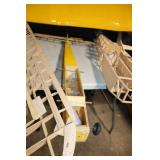 Partially Assembled Model Airplane Kit with Yellow Wing
