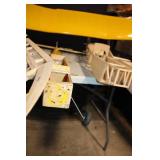 Partially Assembled Model Airplane Kit with Yellow Wing