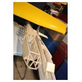 Partially Assembled Model Airplane Kit with Yellow Wing