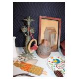 Diverse Collection of Home Decor Items Including Figurines and Wall Hangings