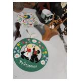 Diverse Collection of Home Decor Items Including Figurines and Wall Hangings