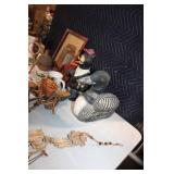 Diverse Collection of Home Decor Items Including Figurines and Wall Hangings