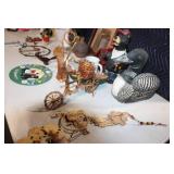 Diverse Collection of Home Decor Items Including Figurines and Wall Hangings