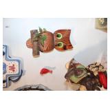 Diverse Collection of Home Decor Items Including Figurines and Wall Hangings