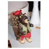 Diverse Collection of Home Decor Items Including Figurines and Wall Hangings