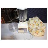 Osterizer Dual Range 8 Blender with Accessories and Carrying Bag