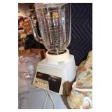 Osterizer Dual Range 8 Blender with Accessories and Carrying Bag