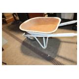 Used Wheelbarrow with Rusted Interior