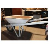 Used Wheelbarrow with Rusted Interior