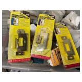 Large Collection of Door Hardware Including Latch Protectors and Strike Plates