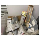 Large Collection of Door Hardware Including Latch Protectors and Strike Plates