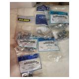 Collection of Various Cam Locks in Factory Packaging