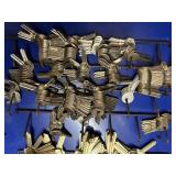 Assortment of 100+ Metal Key Blanks on Display Panel