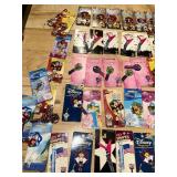 Collection of 50 Themed House Keys featuring Disney and Rock Music Designs