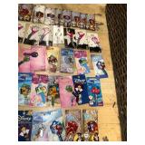 Collection of 50 Themed House Keys featuring Disney and Rock Music Designs