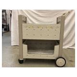 Molded Book Cart featuring a charming flower design! With two roomy shelves and sturdy construction, it’s perfect for organizing books, toys, or supplies in style. Good condition and ready to add a 