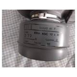 2 Vintage Finnish military gas masks, Suod 61T KRH ASC 12x30, with green canvas carrying bag.