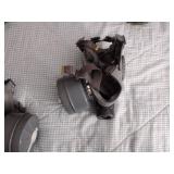 2 Vintage Finnish military gas masks, Suod 61T KRH ASC 12x30, with green canvas carrying bag.