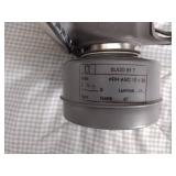 2 Vintage Finnish military gas masks, Suod 61T KRH ASC 12x30, with green canvas carrying bag.