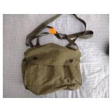 2 Vintage Finnish military gas masks, Suod 61T KRH ASC 12x30, with green canvas carrying bag.