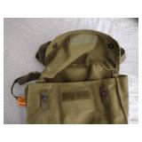 2 Vintage Finnish military gas masks, Suod 61T KRH ASC 12x30, with green canvas carrying bag.