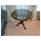 Round Pedestal Tilt-top Table with glass protective cover. 30” x 30” x H 27”